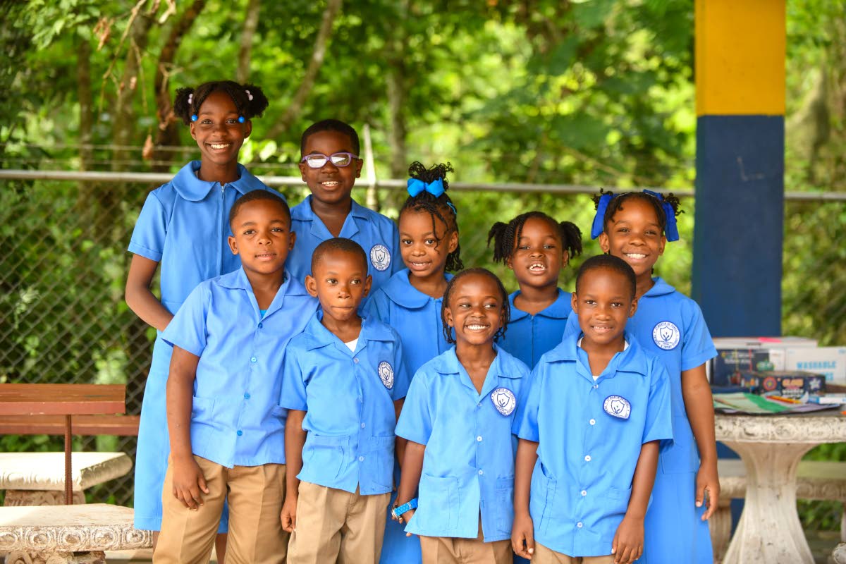 Spark Your Art competition winners (back row, from left) Alexandria Pinnock, Jayden Barnett, Ulani Daley, Alayjah Lawrence, Kajli Downer and (front row, from left) Chevoney Powell,  Rashane Reid, Kahlil Simpson, Liam Allen, pose at the St Martin de Porres 