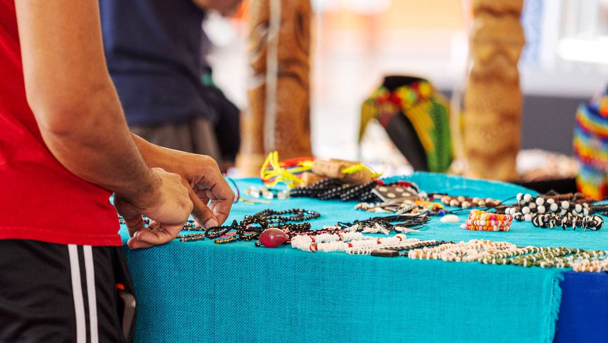 A visitor checks out handmade jewellery at the Grand Market