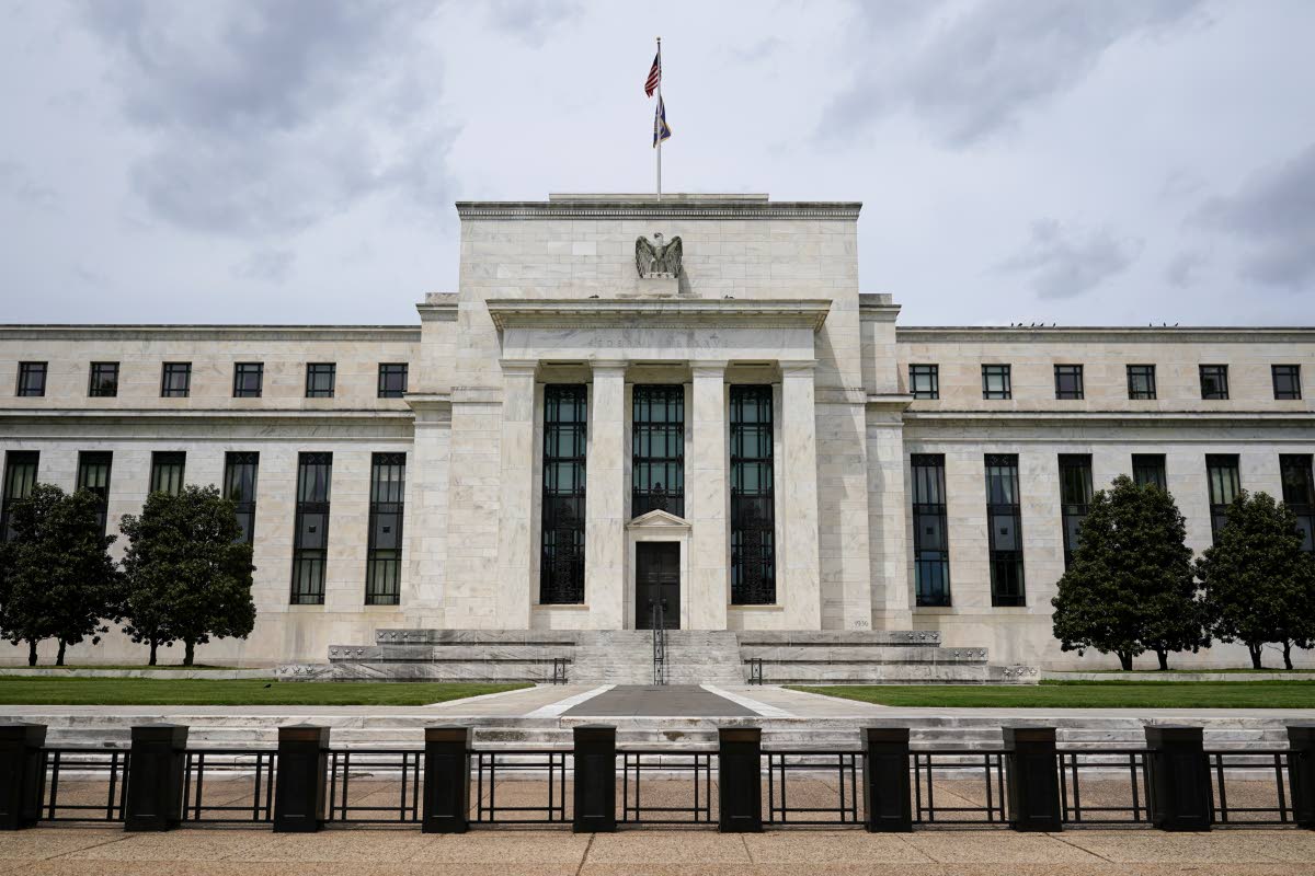 
An American flag flies over the Federal Reserve building on May 4, 2021 in Washington.