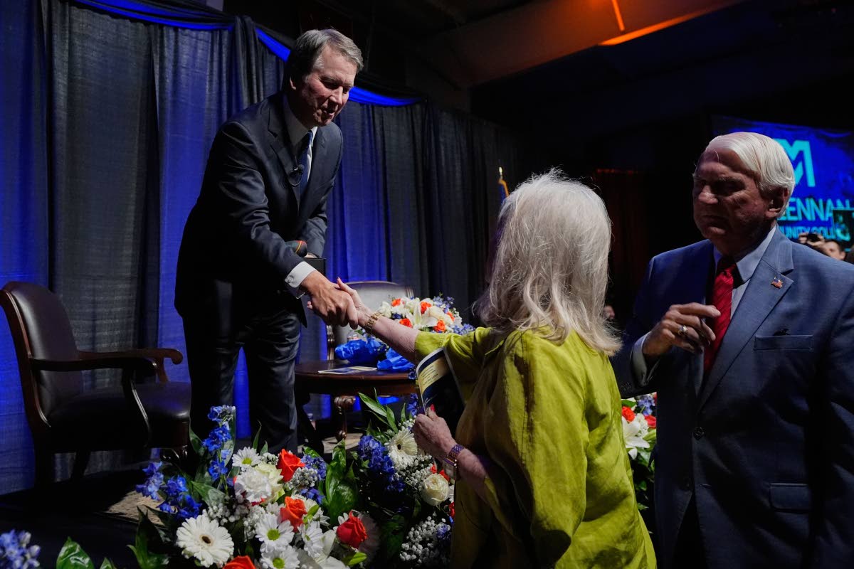 
Justice Brett Kavanaugh (left) is greeted by attendees after he spoke at The Ken Starr Lecture at McLennan Community College last Thursday in Waco, Texas.