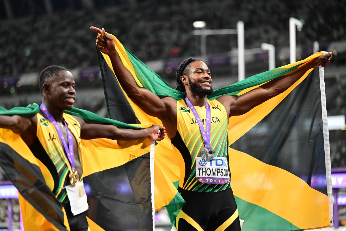 World champion in the men’s 100m Oblique Seville (left) celebrates the win with teamate and silver medallist Kishane Thompson at the World Athletics Championships Tokyo 2025 at the Japan National Stadium, Tokyo, Japan, on Sunday, September 14. 