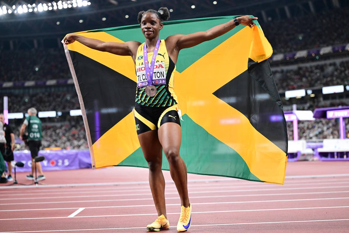 Tina Clayton celebrates silver and a personal best in the women’s 100m finals. 