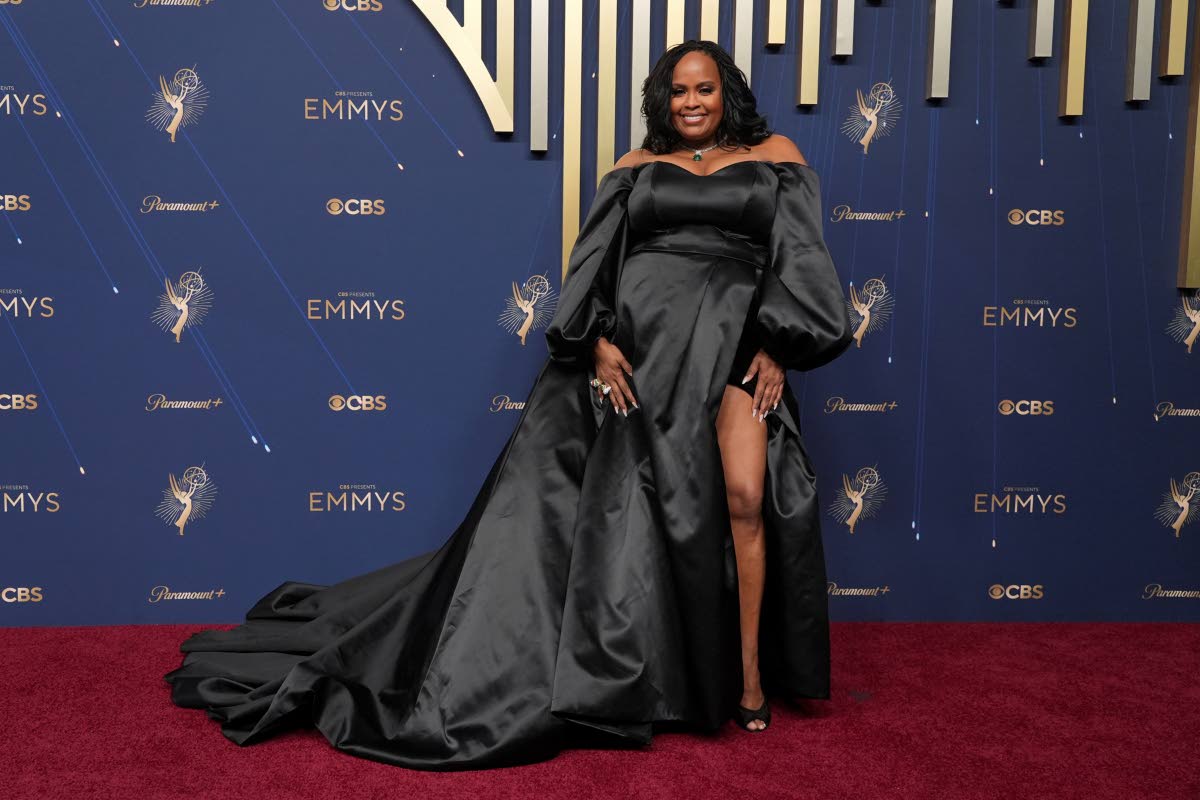 Natasha Rothwell owns the carpet in a black ball gown from Ines Di Santo. 