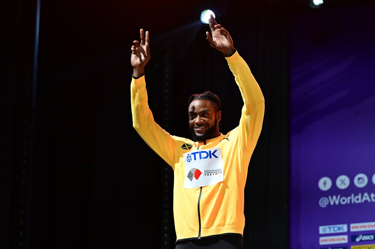 Jamaica’s Kishane Thompson waves to the audience as he mounts the medal podium in celebration of the silver medal he won in the men’s 100 metres at the World Athletics Championships in Tokyo, Japan.