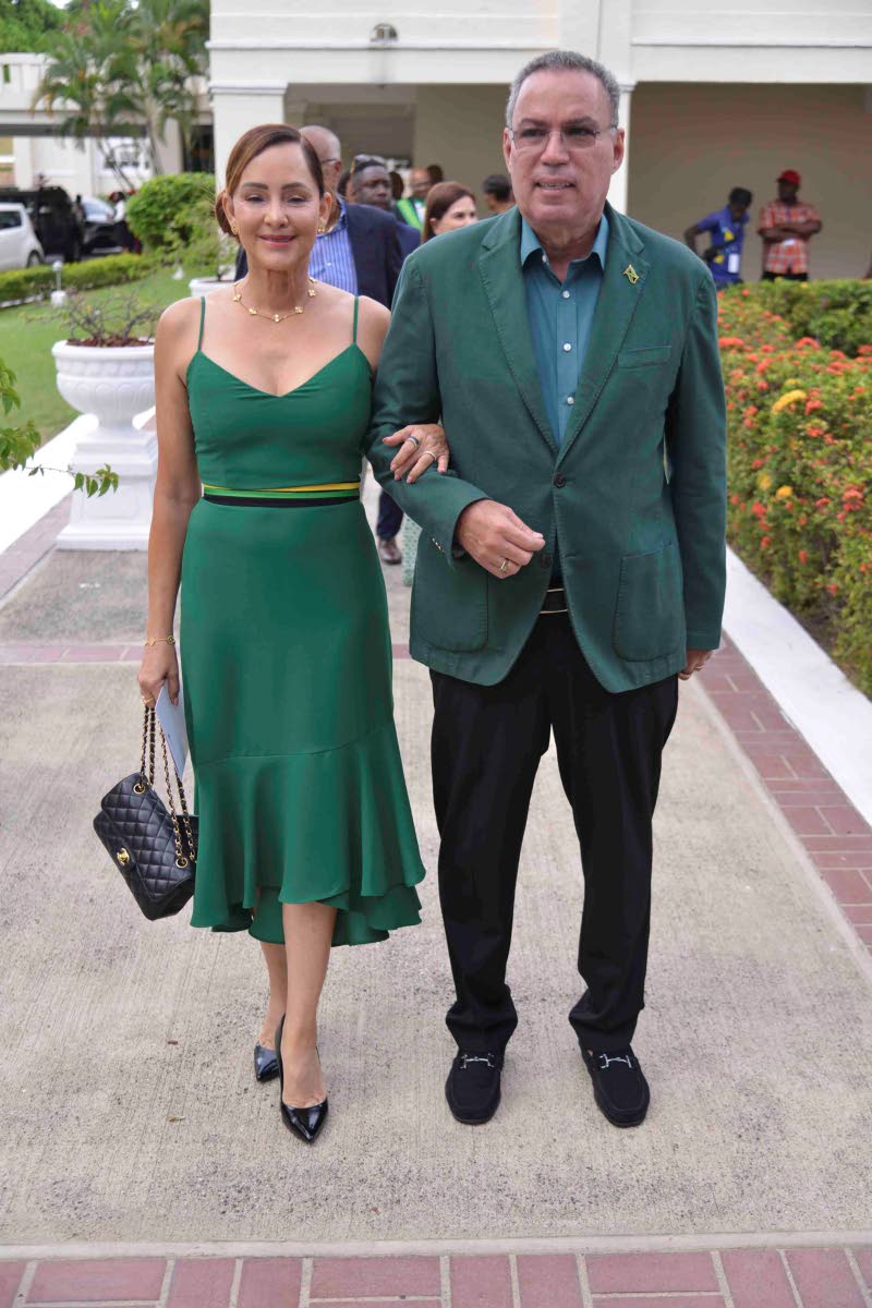 Former member of parliament for Portland Eastern, Ann-Marie Vaz, and her husband, Daryl Vaz, member of parliament-elect for Portland Western, step into the spotlight in coordinated green tones.