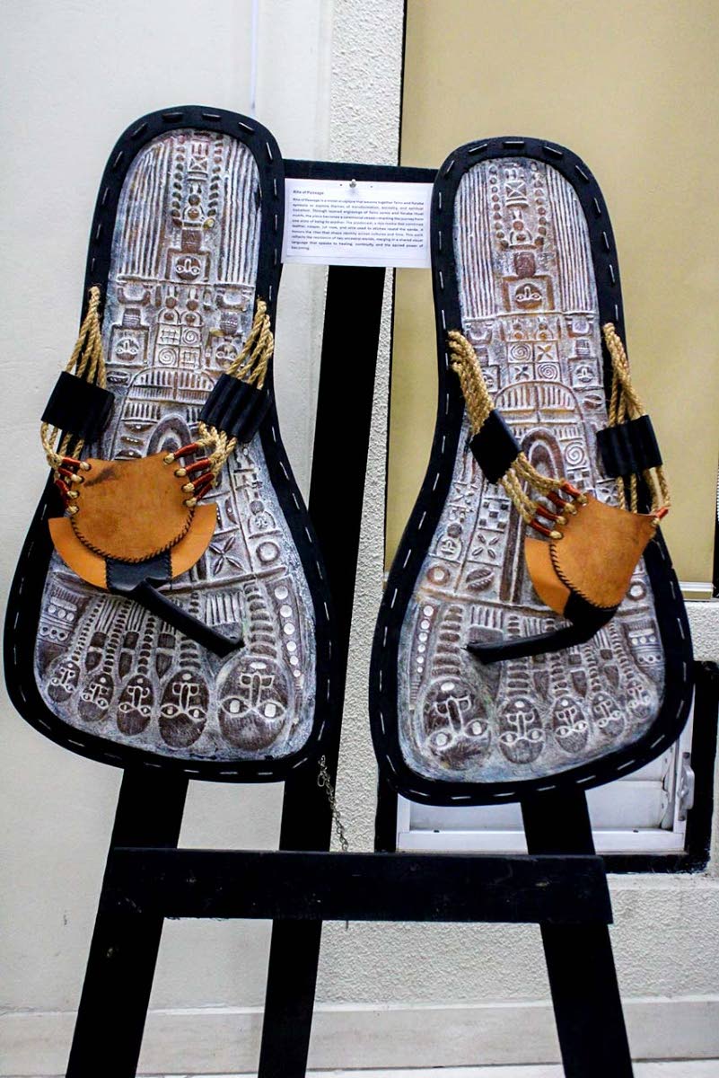 The work of Alao Luqman Omotayo is displayed inside the Library Multifunctional Room at The University of the West Indies, Mona campus, for the Conversations with Olive Senior Book Launch event. 