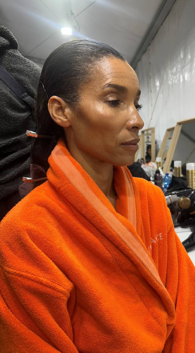 Gordon is prepped with hair and make-up for the runway.