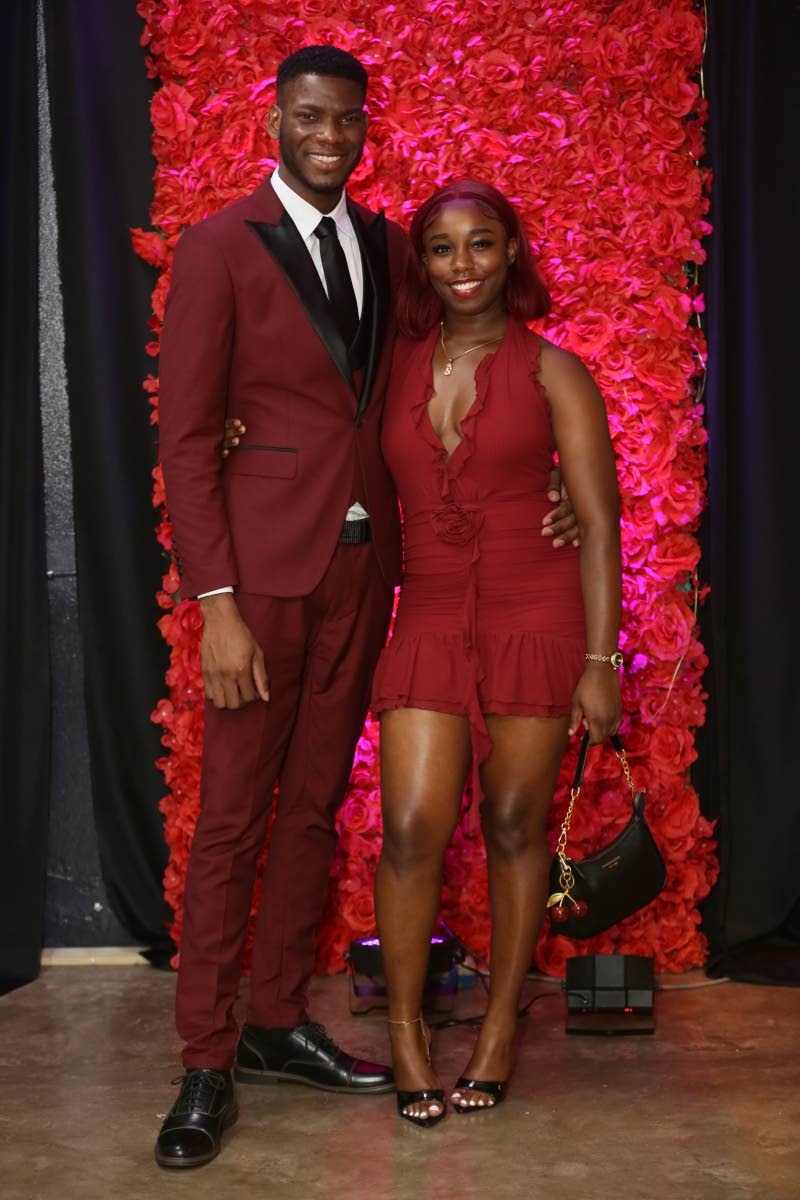 Keneil McLean, co-founder of K&J Travel, and Empress Johnson pose for our lens.