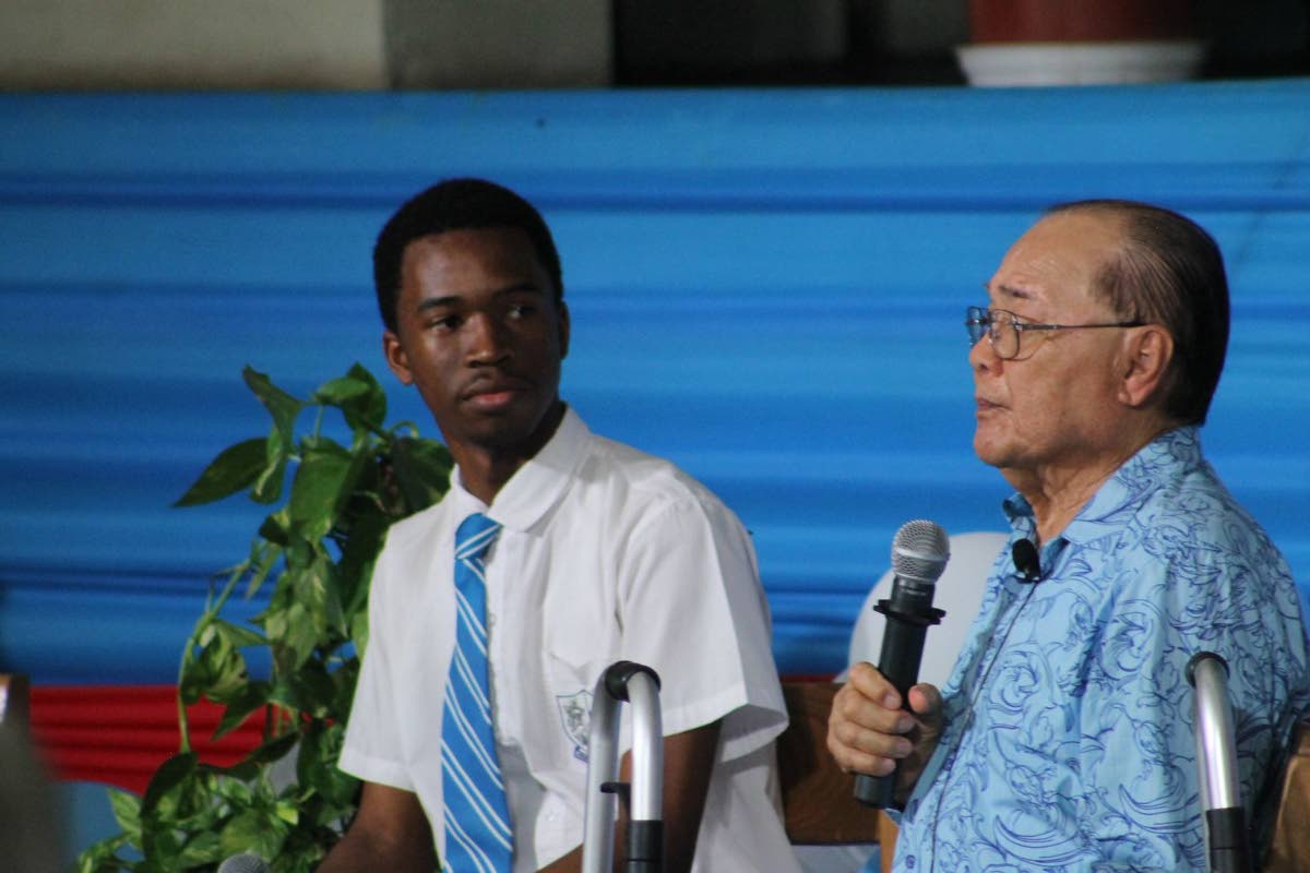 Ricardo Ellis (left), deputy headboy of St George’s College, takes part in a question and answer session with Philip Wong.