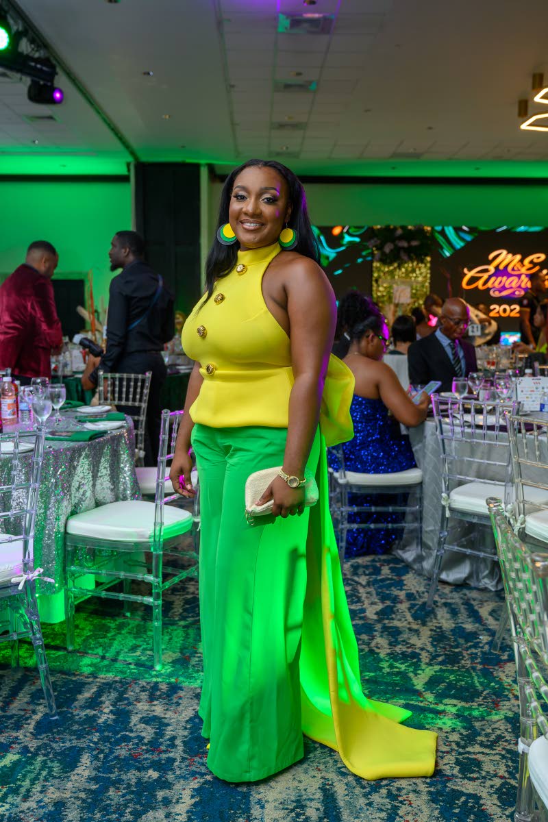 Sara Stamp-Bonnick turns heads in a vibrant yellow-and-green ensemble inspired by the colours of the Jamaican flag.