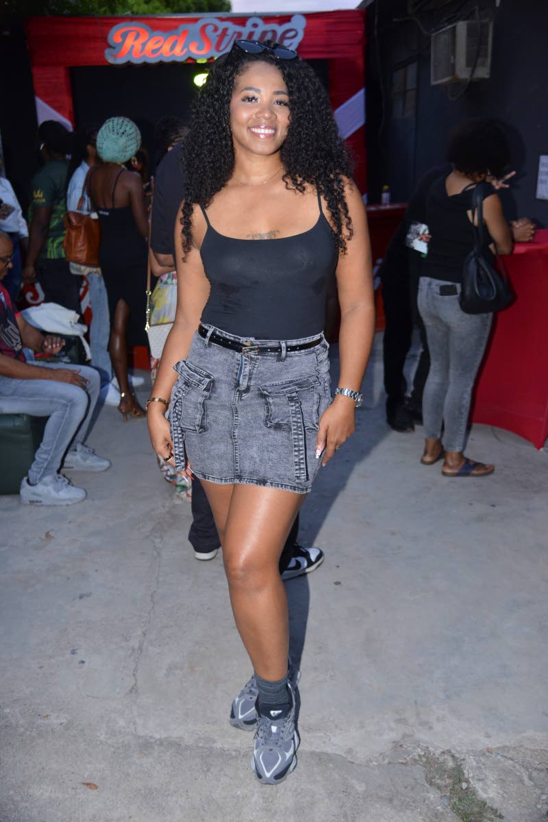 Media personality and content creator Kerry-Ann ‘Chiney K’ Collins paired trainers with a cargo skirt and cami. 