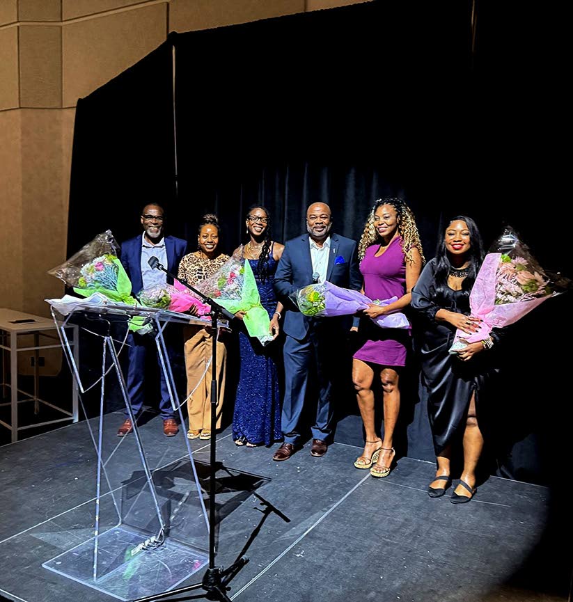 Chris Campbell (third right) is flanked by organisers of the event to honour him on his retirement. From left: David Betty, Audrey Campbell, Mulisius Joe, Obioma Dike and Rosemarie Powell.