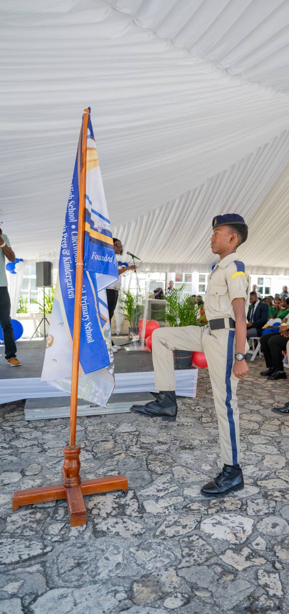 A Cornwall College cadet participating in the flag ceremony during the proclamation event.