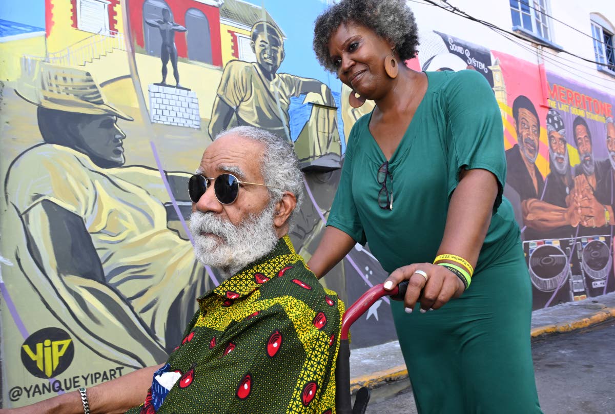 Monte Blake (left) and daughter, Monique Blake at the unveiling of the Merritone mural last year in the Kingston Creative Art District in downtown Kingston.