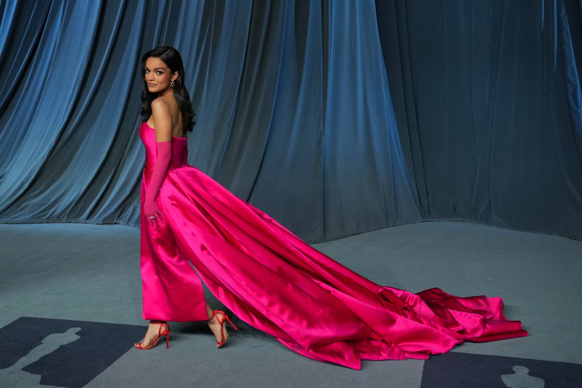 Rachel Zegler cuts a fine figure in couture Tamara Ralph and strappy Jimmy Choo heels.