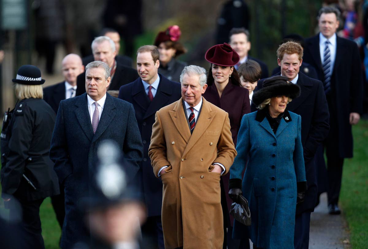 FILE - From (left), Britain’s Prince Andrew; Prince William; Prince Charles; Kate Middleton, Duchess of Cambridge; Camilla, Duchess of Cornwall, and Prince Harry arrive to attend a Christmas Service at St Mary’s church on the grounds of Sandringham Est