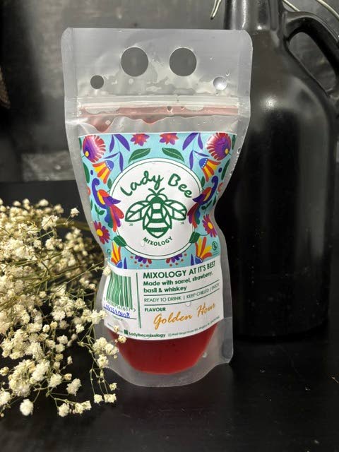 Golden hour, a warm embrace of Jamaica in a glass where rich sorrel, ripe strawberries, and a whisper of basil meet bold whiskey.