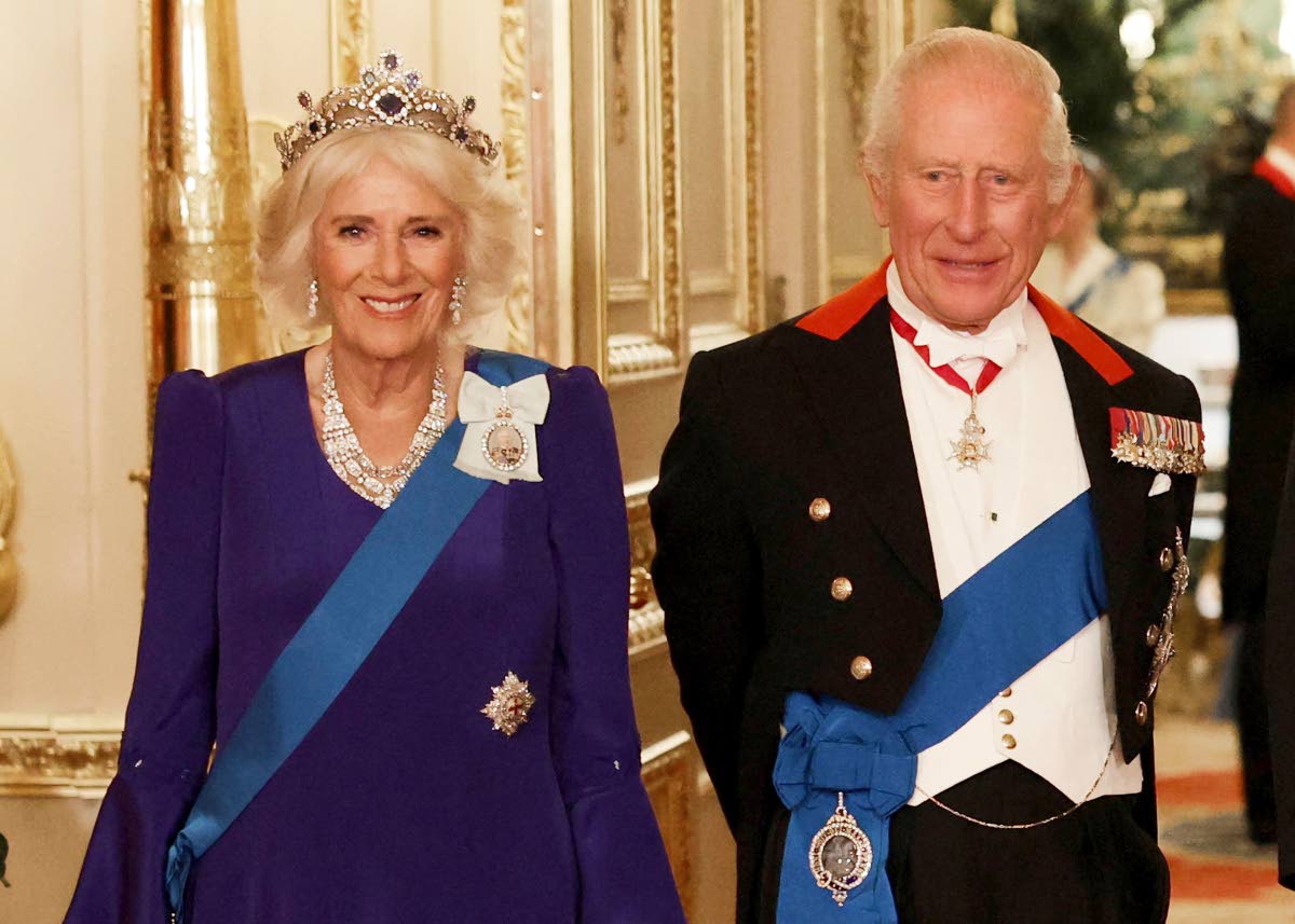 Britain’s Queen Camilla (left) and King Charles III (right) pose for a photo before a State Banquet at Windsor Castle, in Windsor, England.