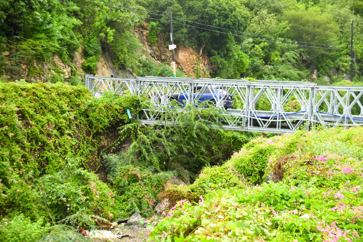 The gully and bridge above where flooding frequently occurs in the community of Taylor Land, St Andrew, where the ministry has requested residents to evacuate. 