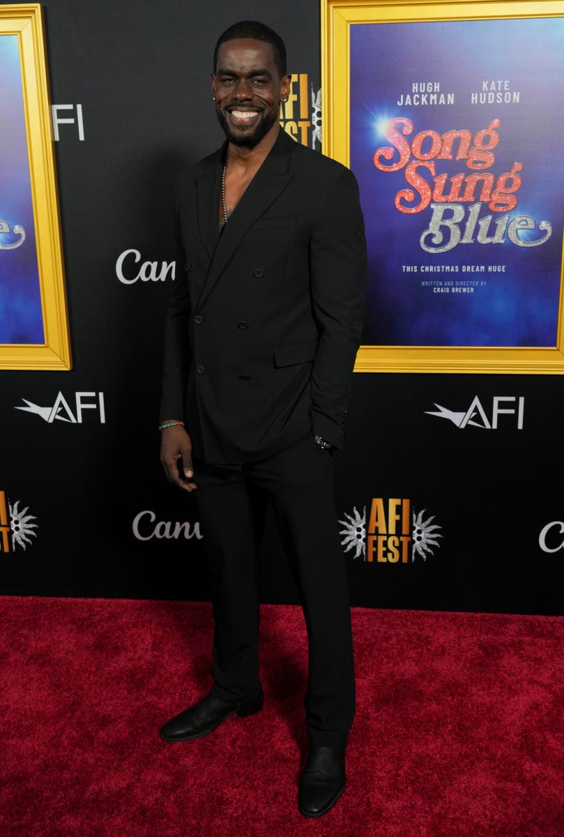 Mustafa Shakir, who is of the ‘Song Sung Blue’ cast, smiles for the camera.
