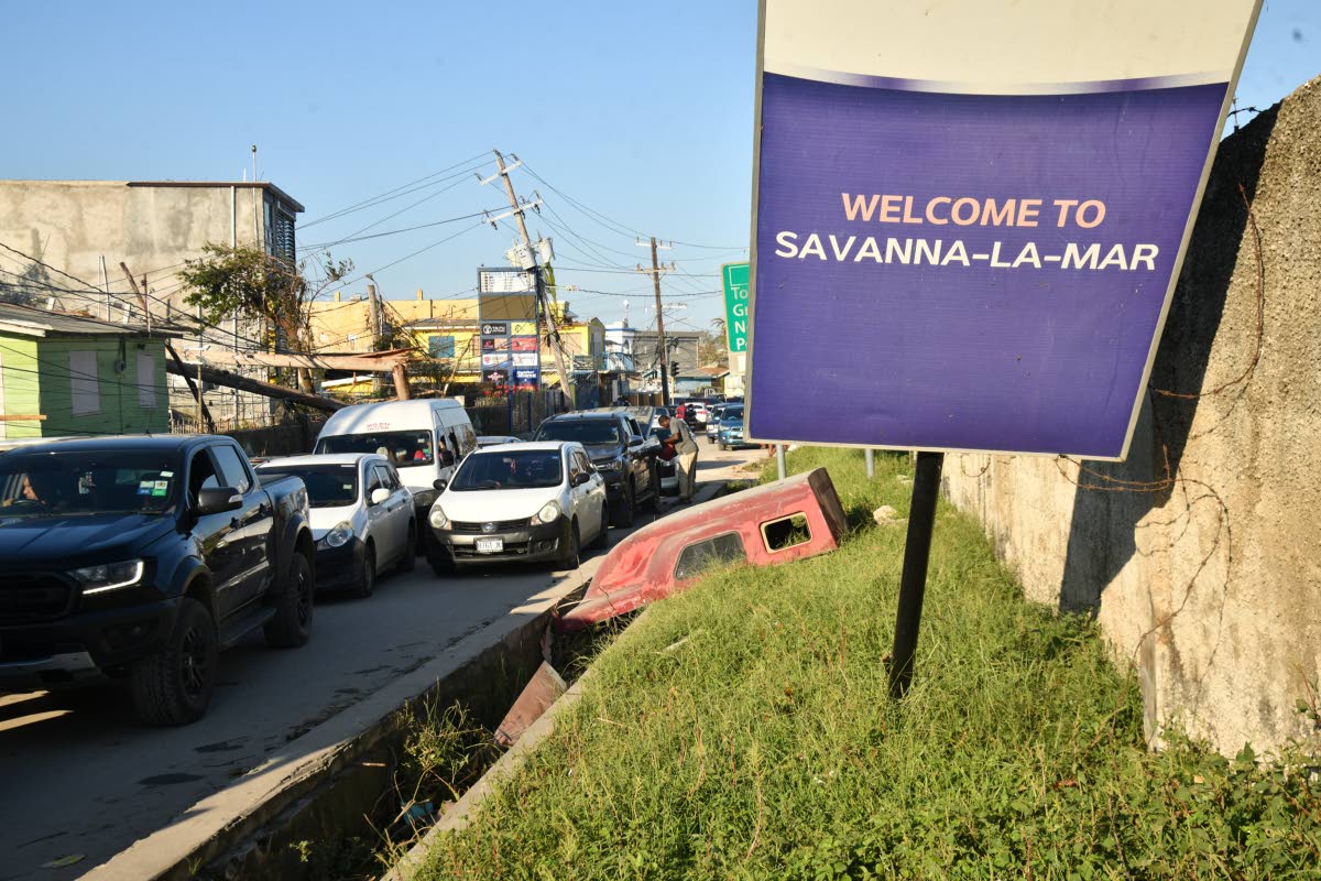 Traffic builds up in Savanna-la-Mar, Westmoreland, as people transport supplies to the parish following Hurricane Melissa on Friday.