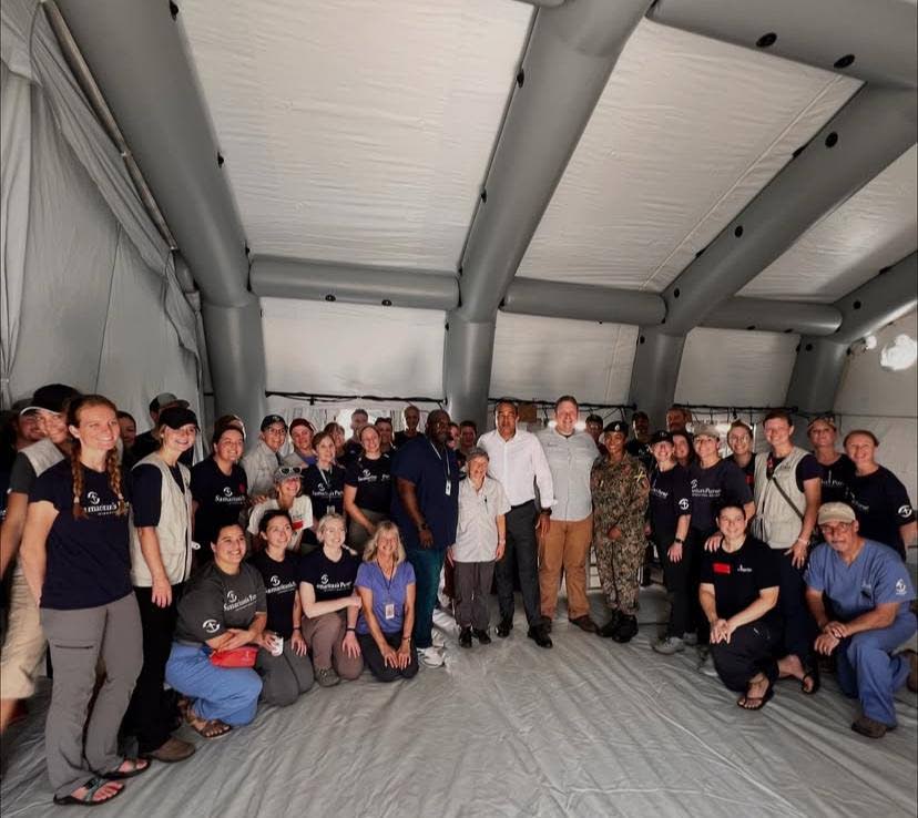 Minister of Health and Wellness, Dr Christopher Tufton, (centre) with a team from international Christian relief organisation Samaritan’s Purse at the field hospital that was set-up by the organisation on the grounds of the Black River High School in St 