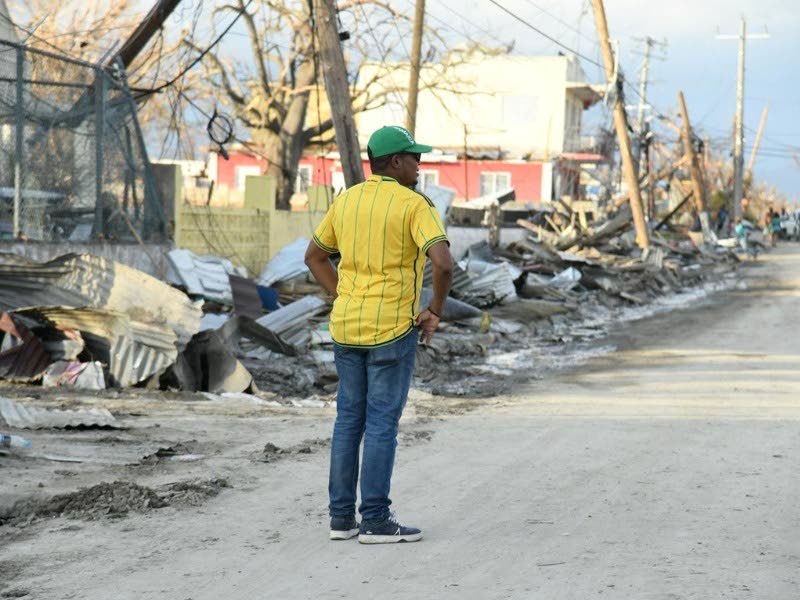 
Minister of Agriculture Floyd Green surveys damage during a tour of St Elizabeth in the aftermath of Hurricane Melissa, which hit Jamaica on October 28, 2025, causing widespread devastation to the agricultural sector.