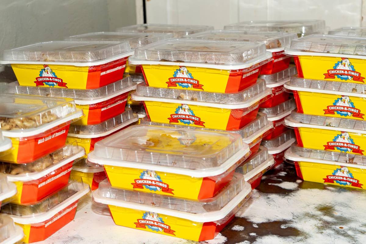 Hot and ready meals are packaged at Chicken & Tings and airlifted to affected areas in western Jamaica.