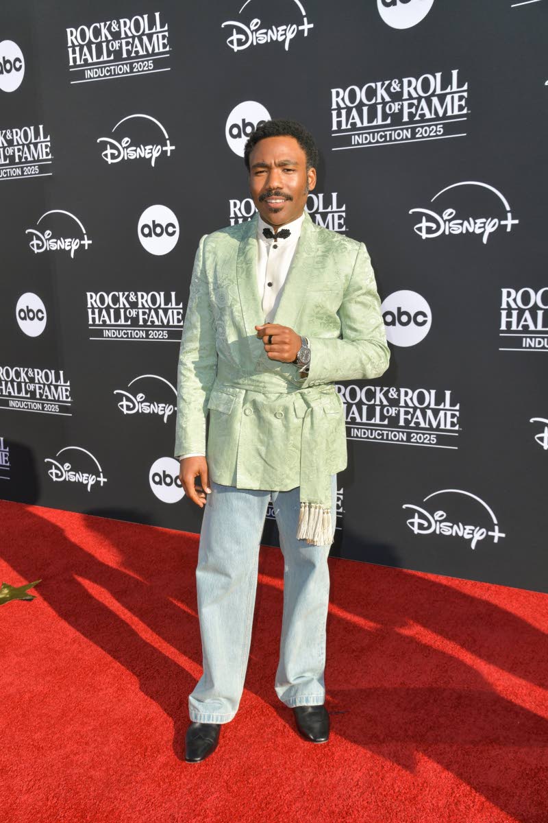 Donald Glover arrives at the 2025 Rock & Roll Hall of Fame induction ceremony wearing Valentino.