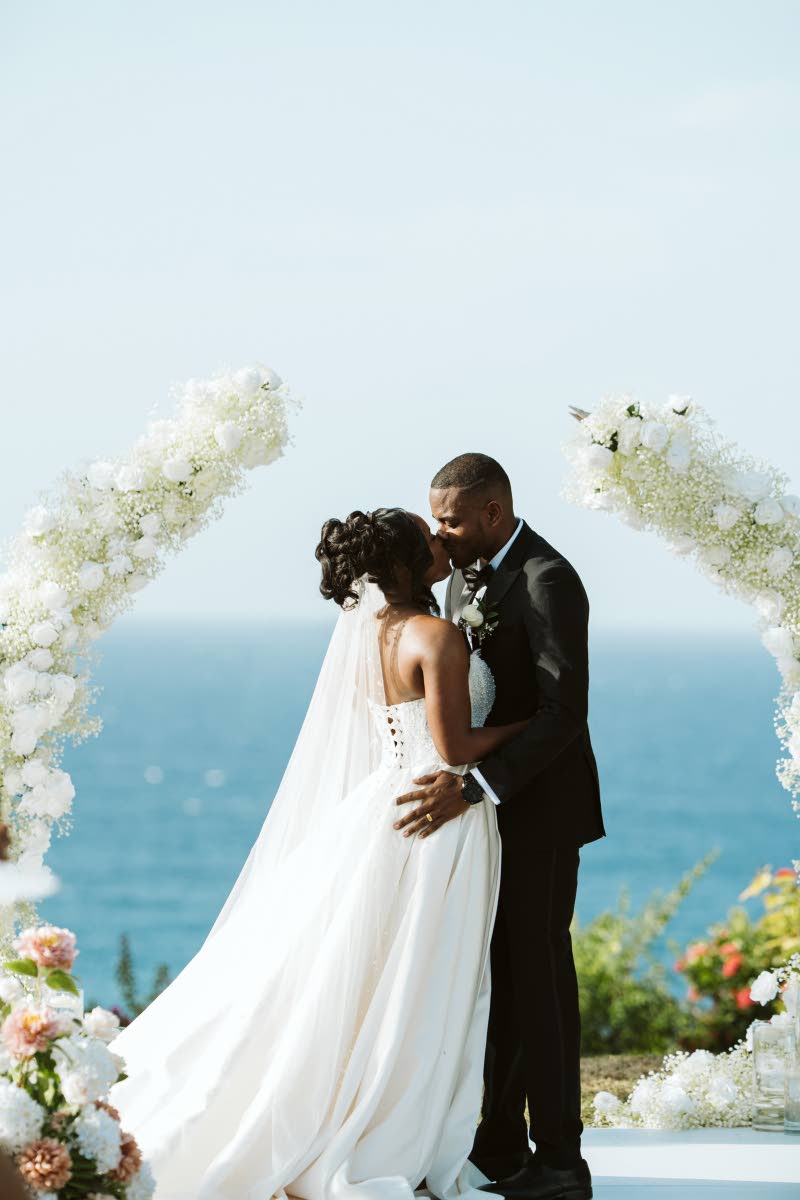 Sealed with a kiss, the new Mr and Mrs Harris made their promises official.