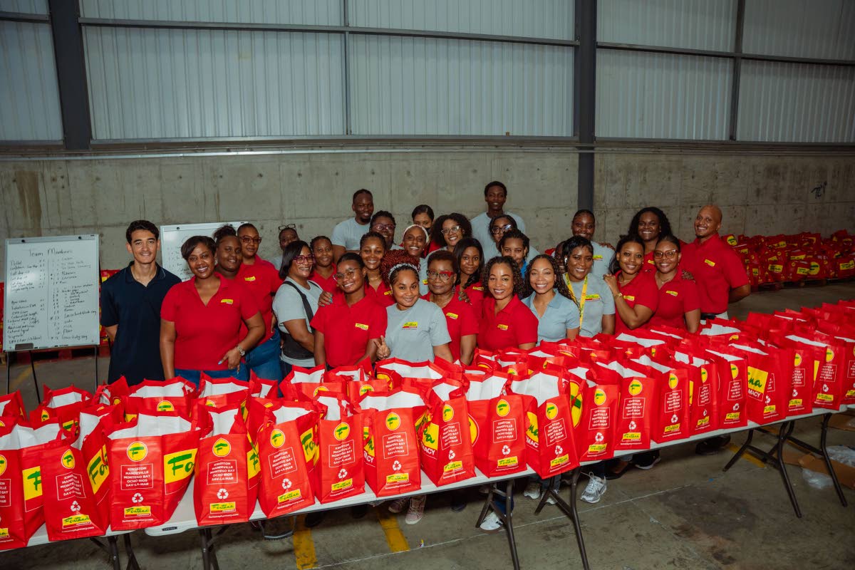 Team members from several locations coming together to prepare care packages.