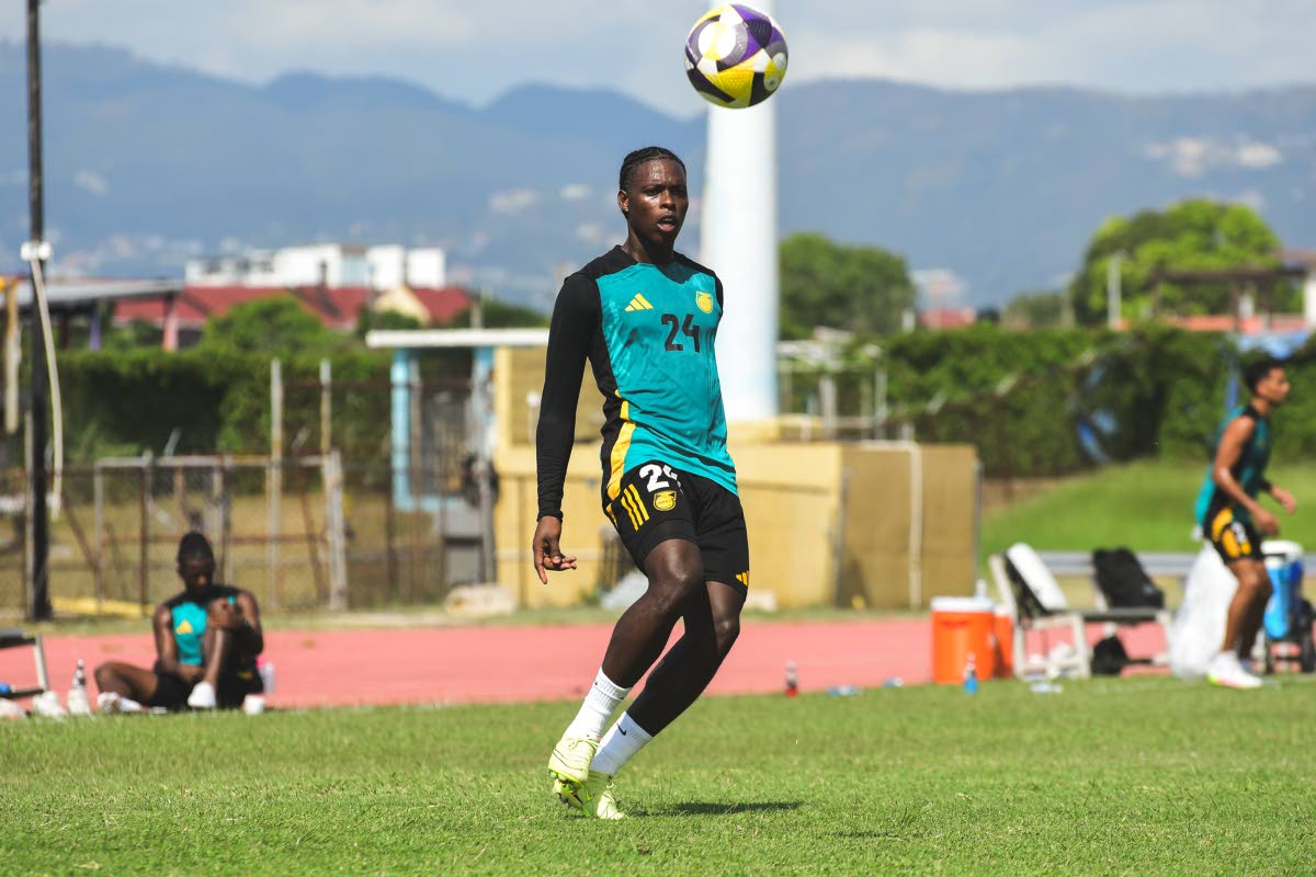 Reggae Boy Warner Brown gets ready to control a ball during a training session in Trinidad and Tobago on Tuesday.