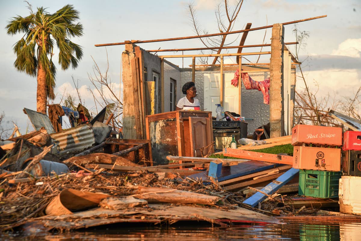 Dian Banton surveys the remains of her and her sister’s home in Crane Corner, St Elizabeth after the passage of Hurricane Melissa last month.