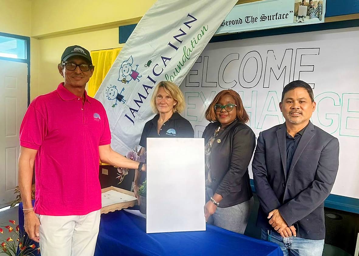  Kyles Mais, general manager Jamaica Inn, displays the Starlink Gen 3 system presented to Exchange Primary, along with Belinda Morrow, board member, Jamaica Inn Foundation; Natalie Oates-Johnson, principal, and Gregory Chung, school board chairman.