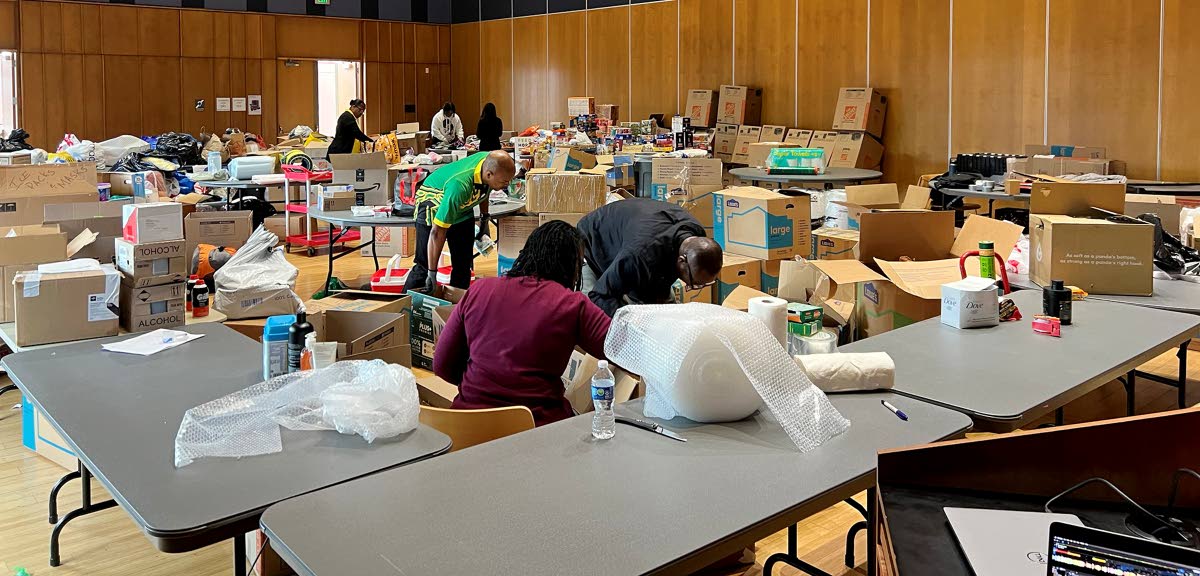 Volunteers sort through hurricane relief supplies at one of the Silver Spring, Maryland, drop off centres.