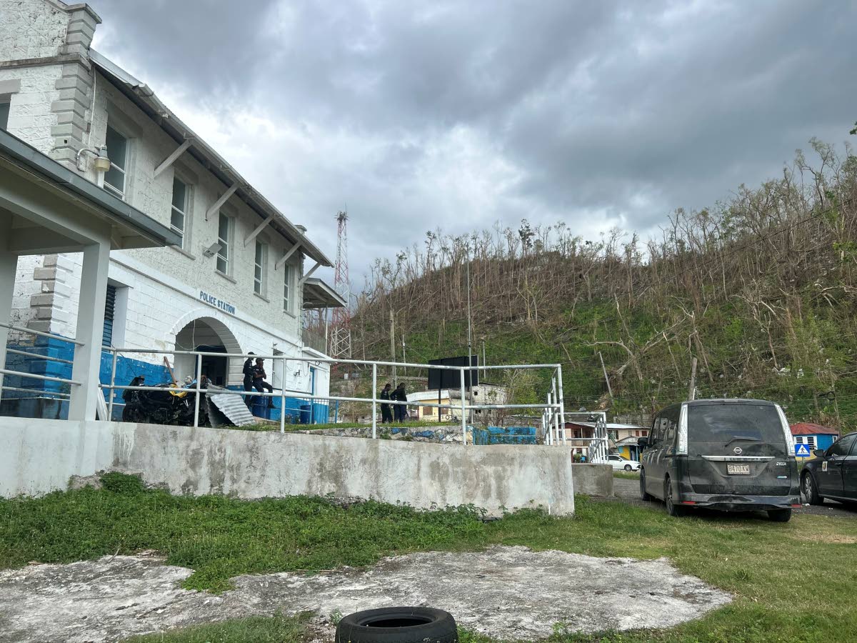 The Withorn Police Station, where the Withorn Outstation sits on top, juxtaposed by trees ravaged by Hurricane Melissa.