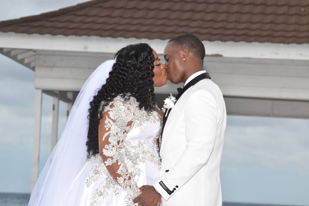 The Gaynors seal the deal with a passionate kiss. 