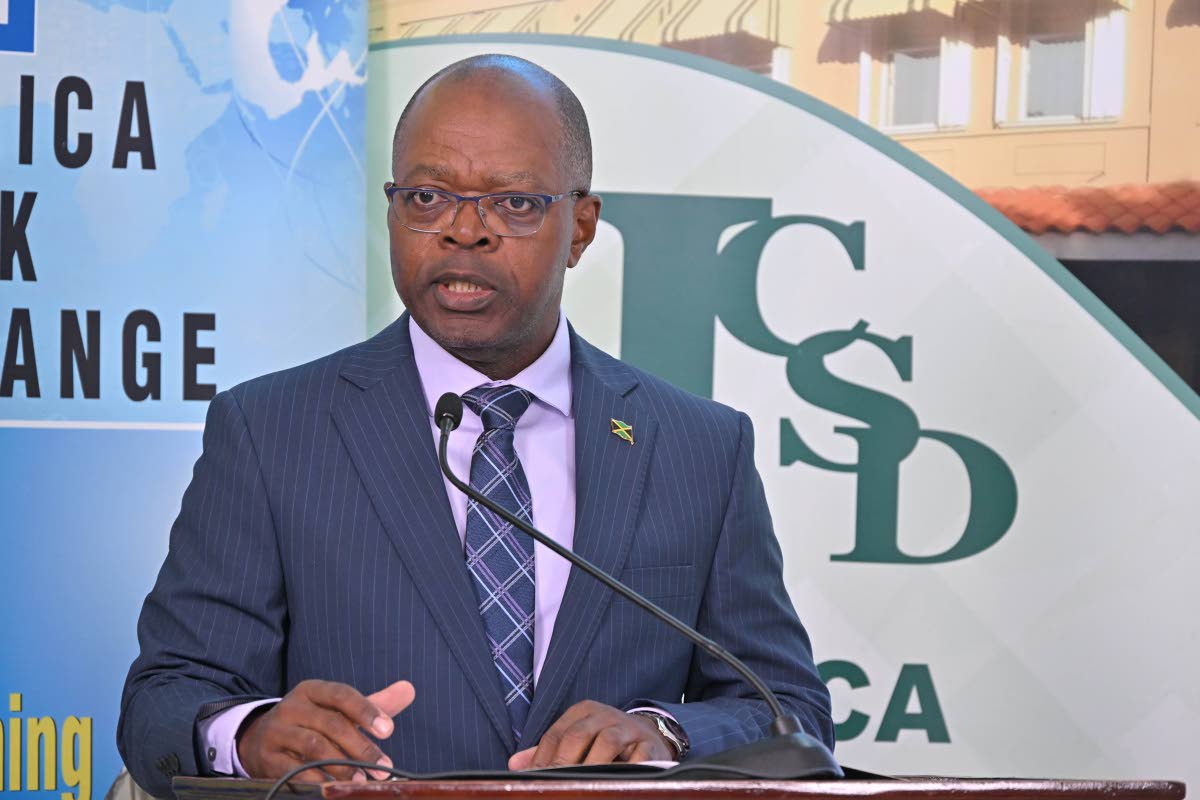 Chief Executive Officer of the Jamaica Stock Exchange (JSE), Livingston Morrison, addresses the JSE Market Research Awards held on November 20 at the JSE’s Harbour Street offices in Kingston..