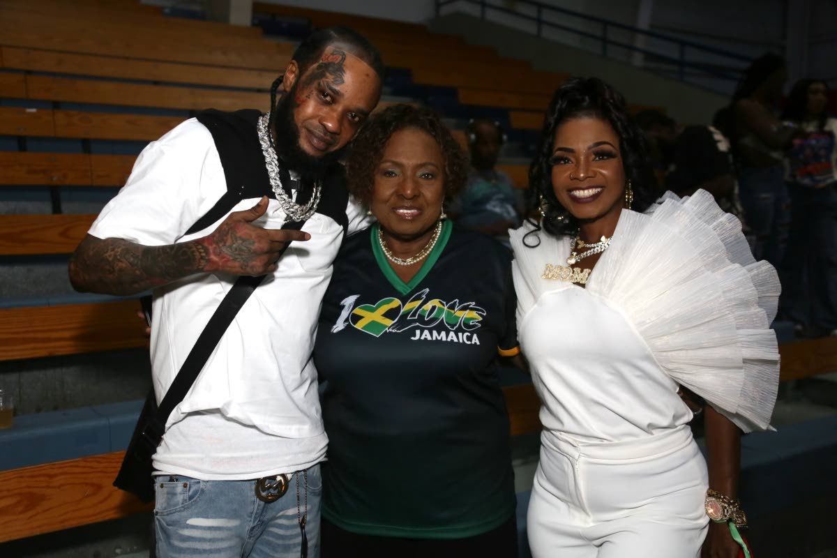 Olivia ‘Babsy’ Grange (centre), minister of culture, gender, entertainment and sport, is flanked by dancehall artistes Tommy Lee Sparta (left) and Pamputtae.