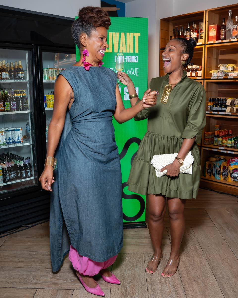 Charl Baker (left), creative alchemist, in a bold SiiM Tropical Habit ensemble, and Gabrielle Burgess, CEO of Suga Lifestyle, wearing By Saffron Safari, brought stylish flair to the occasion.