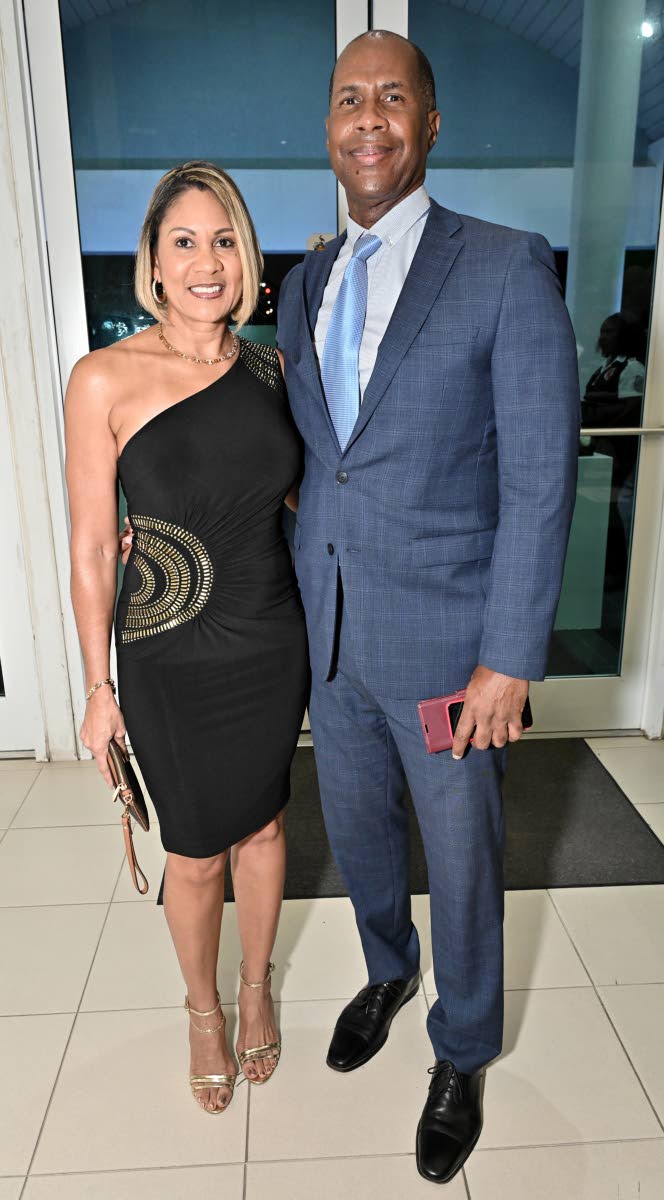 Guest speaker Bruce James, president and authorised athletes representative, MVP Track Club, and Leesa Kow, managing director of JN Bank, pause for a photo op.