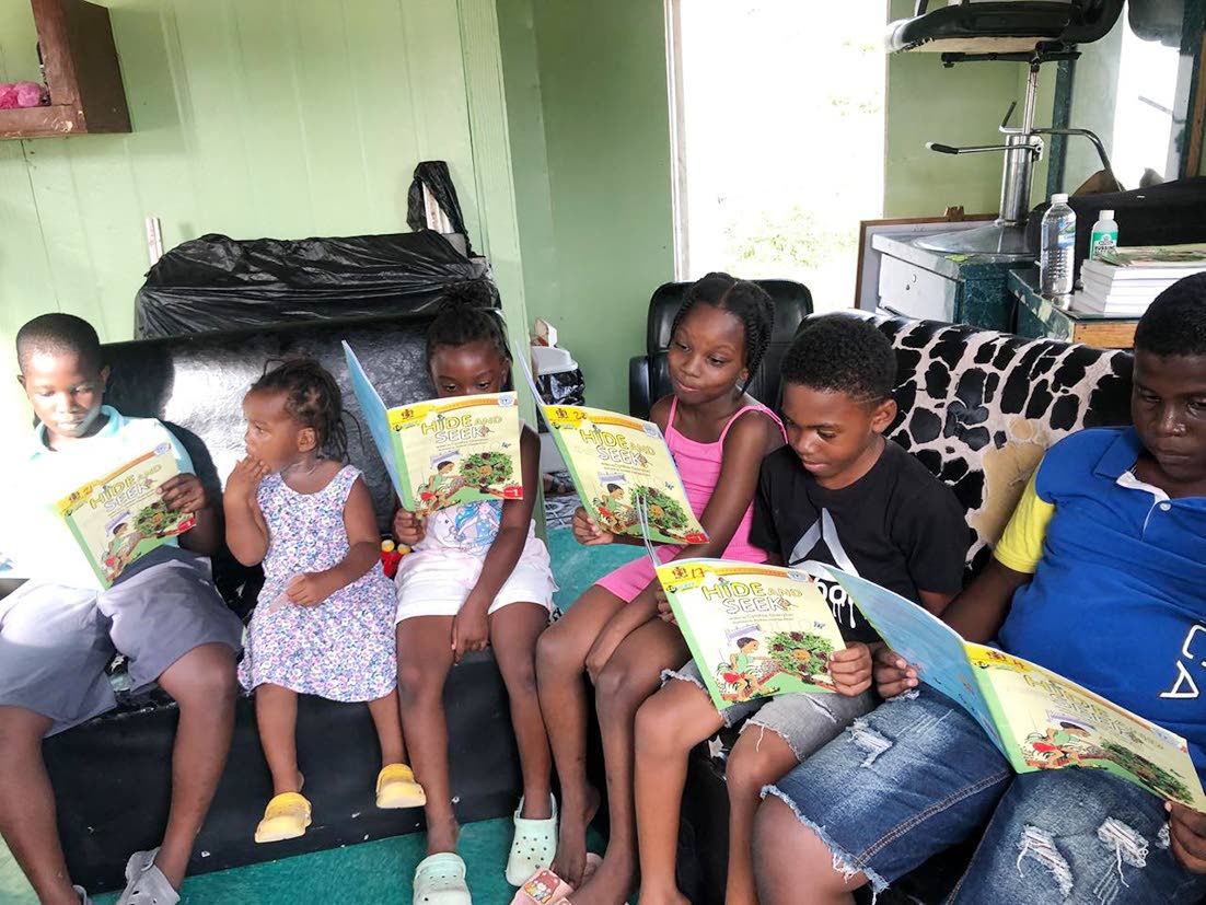 
Students make the most of their temporary classroom, learning and laughing under the guidance of Elaine Morgan.