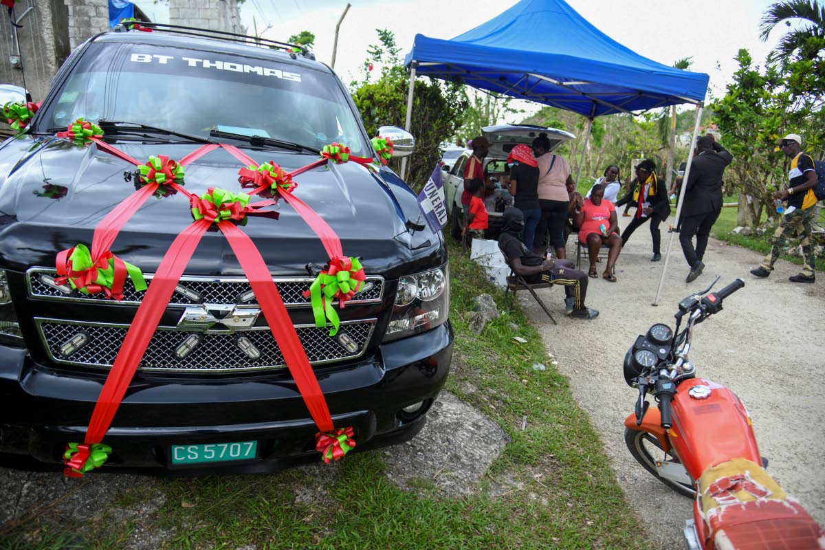 Photos by Antoine Lodge
Family and friends gather in Westmoreland for a repast following the funeral of Cleveland Jeffery, lost during Hurricane Melissa.