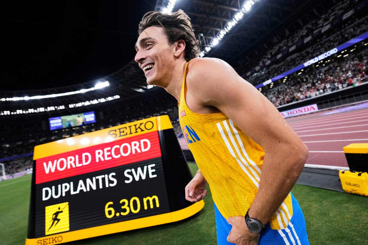 Sweden’s Armand Duplantis reacts after winning gold and setting a world record in the men’s pole vault final at the World Athletics Championships in Tokyo on September 15.
