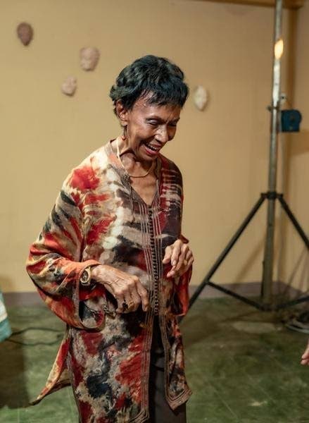 left: Sheila Baugh sashays onto the dance floor, ready to have a good time.