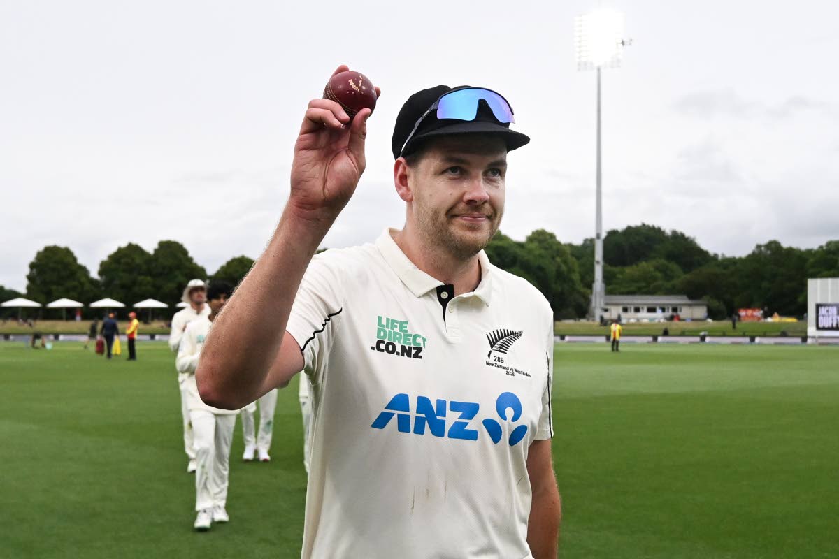 New Zealand’s Jacob Duffy holds up the ball after taking five wickets against the West Indies during the second day of their Test match in Christchurch, New Zealand, on Tuesday.