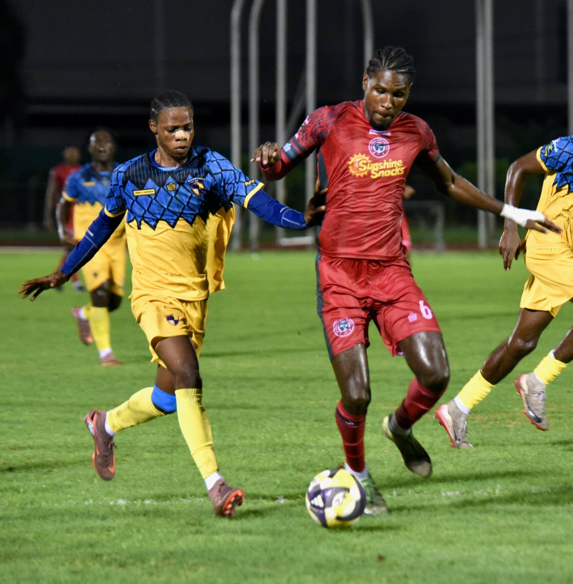 Montego Bay United’s Lucas Lima Correa (right) tries to dribble away from Racing United’s Tameish Richardson during their Jamaica Premier League match at the Catherine Hall Sports Complex in Montego Bay on October 19. 