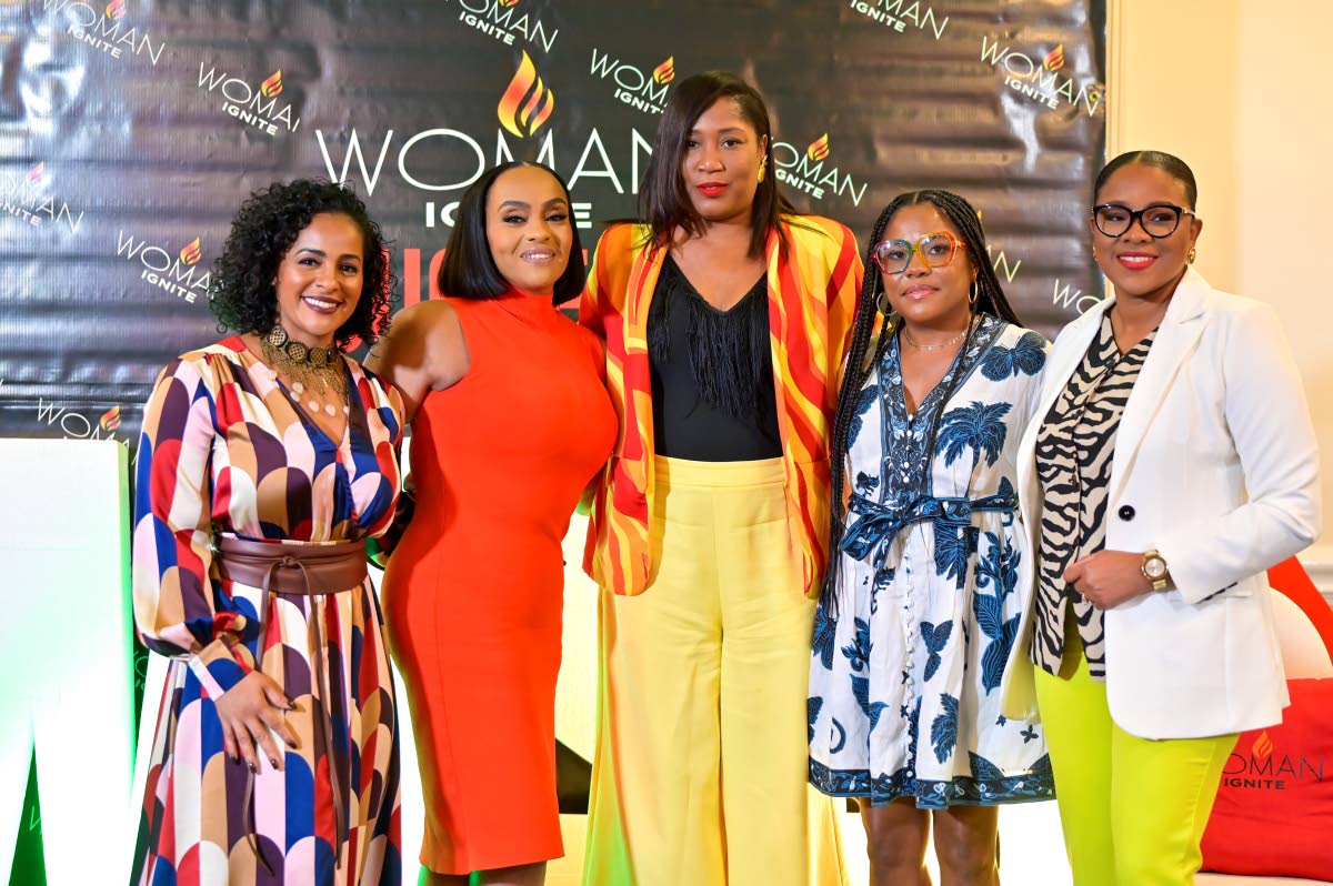 Woman Ignite Success Summit (WISS) founder and convenor Keneshia Nooks Blake (right) shares a photo moment with the panellists of the Beyond Survival fireside chat at the WISS media launch. From left: Shani McGraham-Shirley, fitness and lifestyle coach and