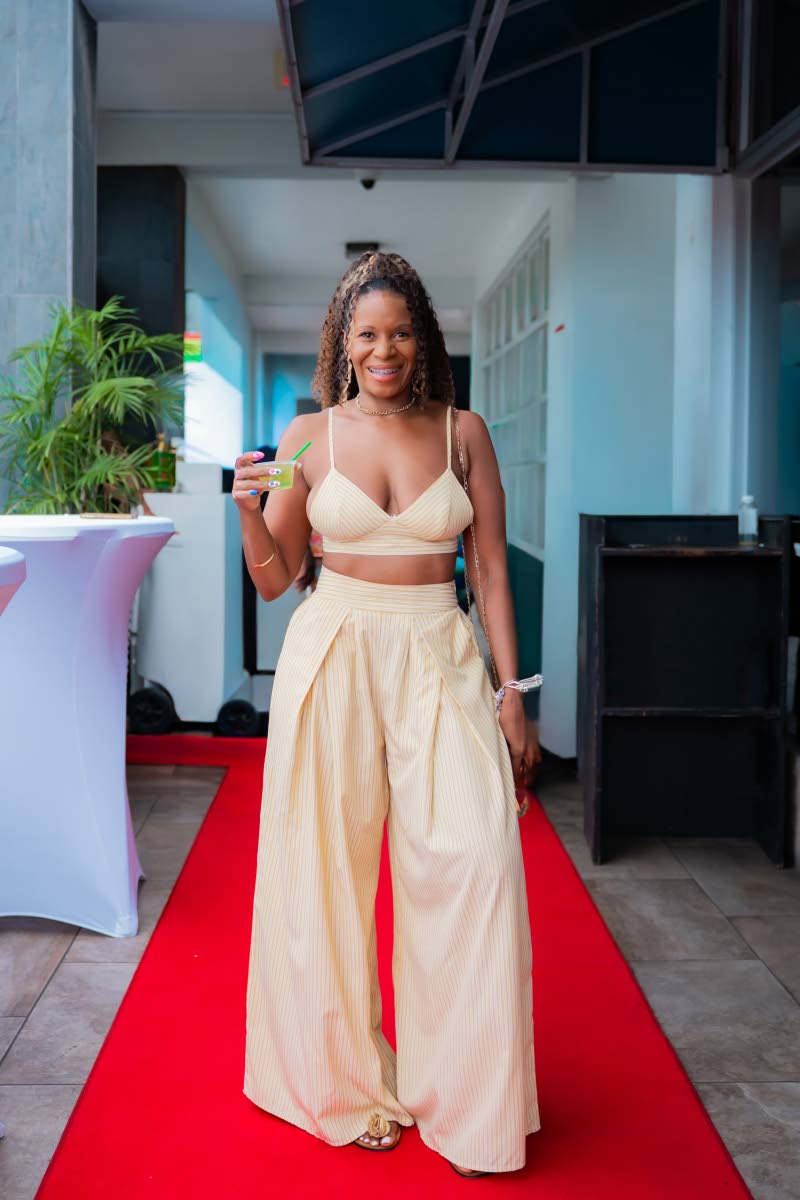 Dr Mandi Elliot swipes right on this breezy yellow pinstripe pants set.