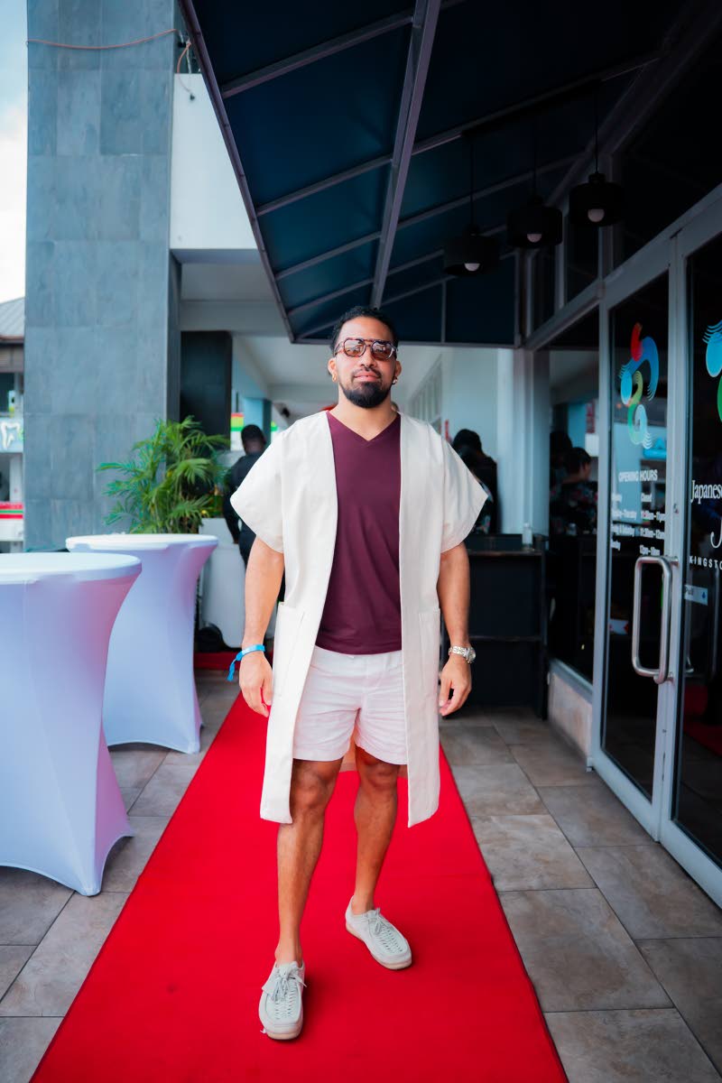 FinTech Executive Dmitri Dawkins goes for a modern resort-casual look.